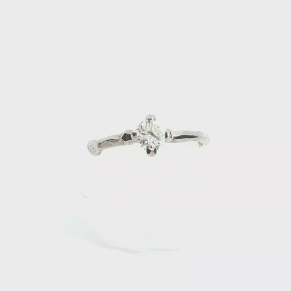white gold twiggy engagement ring with natural white diamond