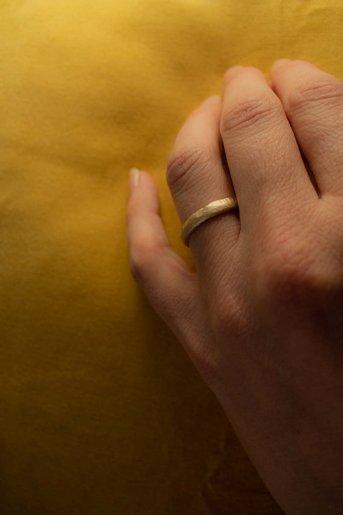 Textured wedding ring with an earthy look * Handcrafted * Recycled gold * Signature gold tones * Combine with gemstones